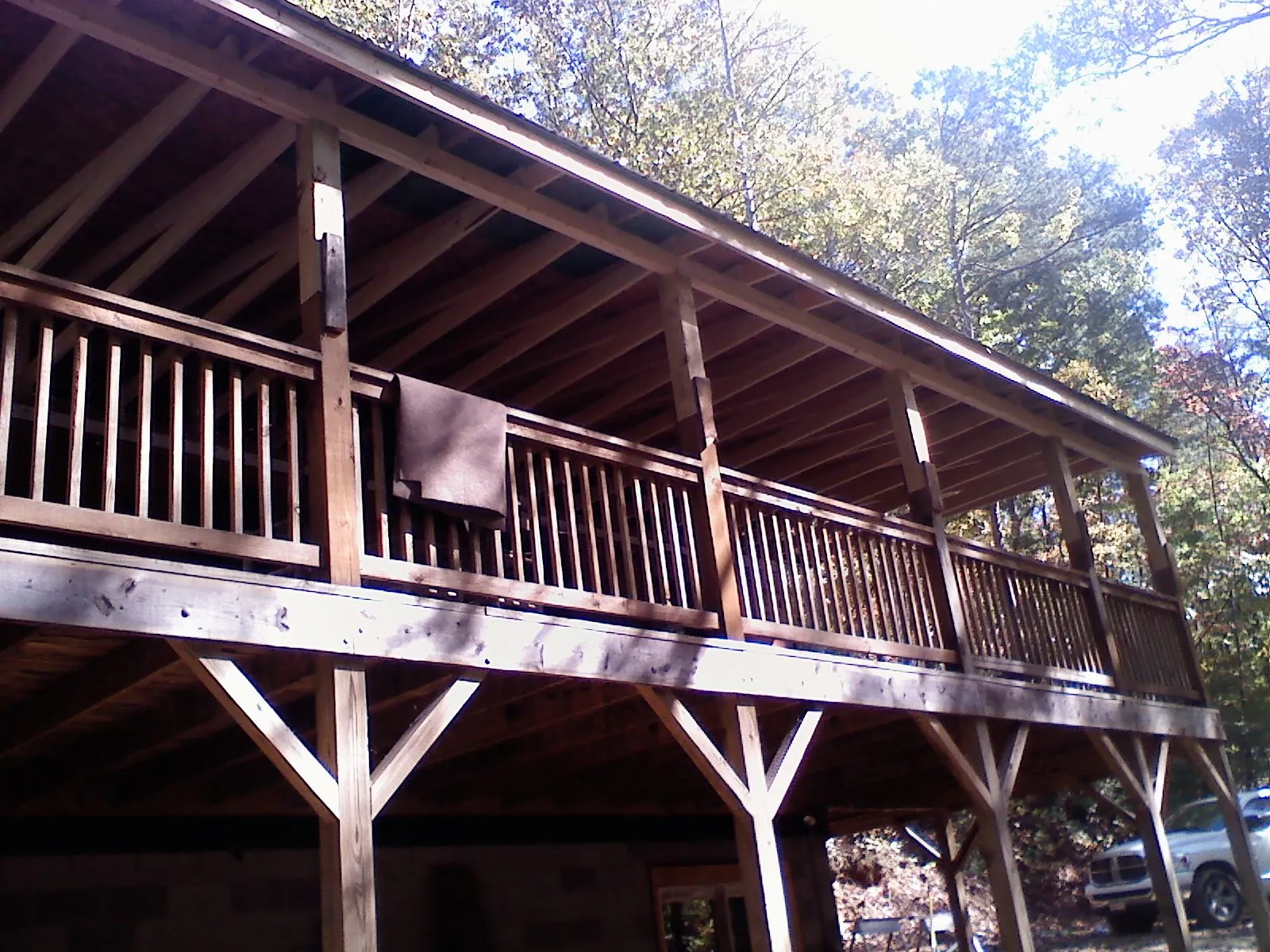 Timber framing under a new elevated porch and deck — Roof Leak Repair in Dallas City by Roofing Brothers